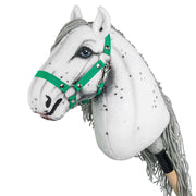 Green hobby horse halter haltered