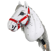 Red hobby horse halter haltered